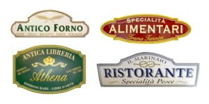 foto con sfondo bianco di 4 insegne antiche